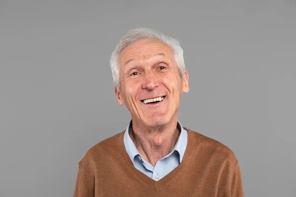 older man smiling