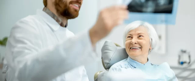 woman smiling at the dentist